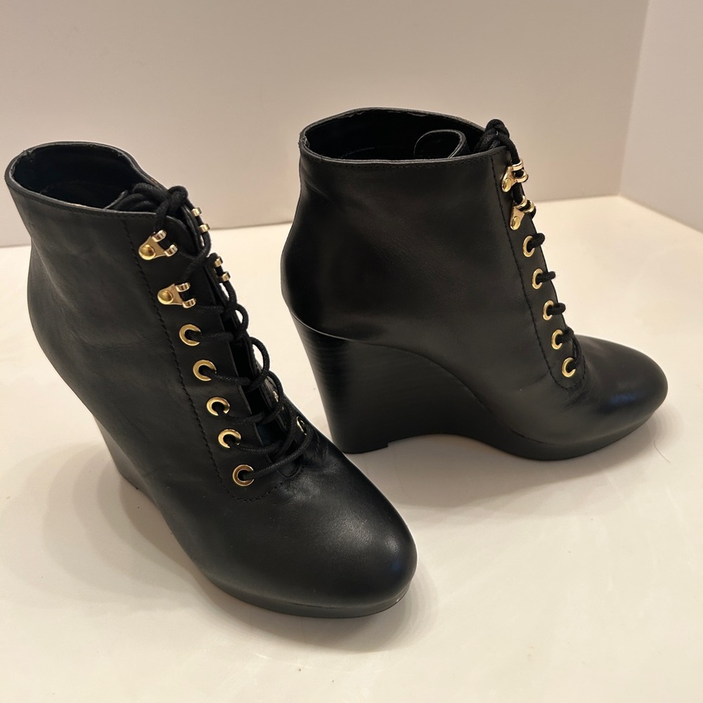 GUESS Black Leather Women’s Black Wedge Ankle Boots with Gold Eyelets, Size 6.